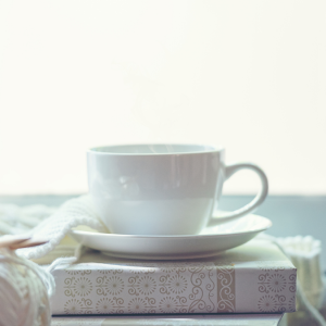 White Cup on Book