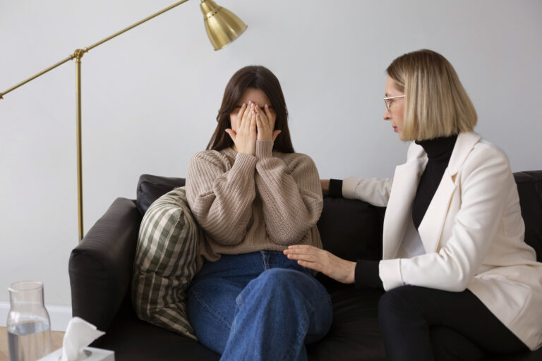 Woman experiencing emotional overwhelm during a counseling session, showing signs it may be time to seek counseling when coping strategies stop working
