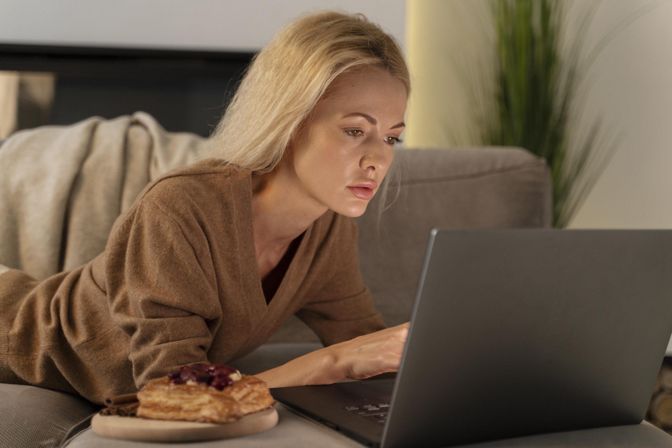 Woman journaling thoughtfully, representing the search for a Christian counselor in Frisco, TX